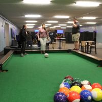 Children playing foot pool