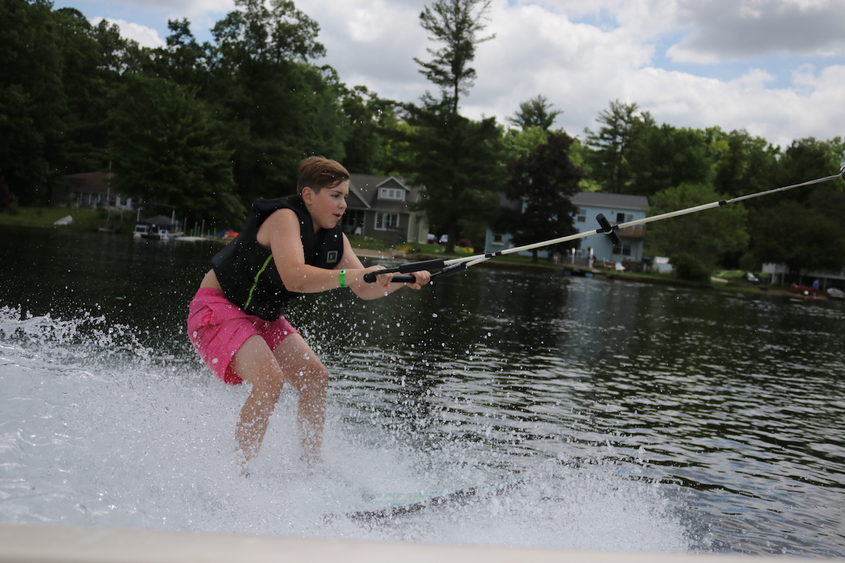 Camper water skiing at Pine Ridge